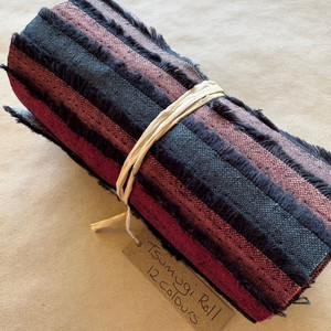 This roll contains 12 colours of Tsumugi, each one 5 inches (12cm) wide x 22 inches (approx 55cm) long. 