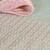 Olympus Lame thread. Hanaikada (Cherry Blossom pink). "Hanaikada" is a word that describes the scene of so many cherry blossom petals that they cover the surface of the water and float down the river like a raft. The deep pink of the overlapping petals and the bright spring sunlight are expressed.