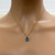 Blue Cubic Zirconia Gemstone Pendant 14K Yellow Gold Oval Prong Set 0.60"