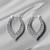 Classic Creativity Heart Carving Textured Drop Earrings