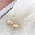 Gold Twisted Oversize Pearl Hoops