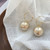 Gold Twisted Oversize Pearl Hoops