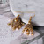 Ethnic Gold Jhumka Tassel Earrings – Pink Zircon