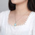 Elegant 925 Sterling Silver Larimar Necklace with Topaz Accents