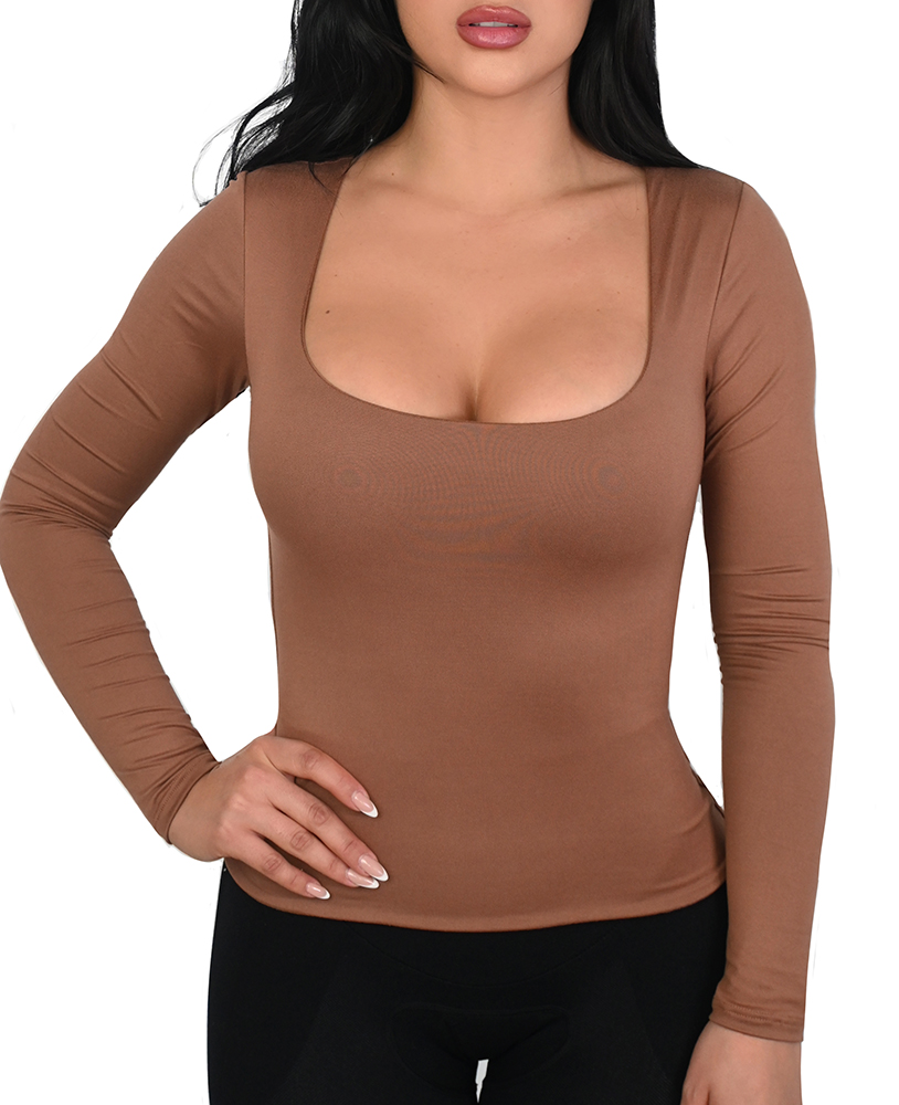 A model is facing the camera wearing the Essential Top Long Sleeve Scoop Neck in Brown Light color