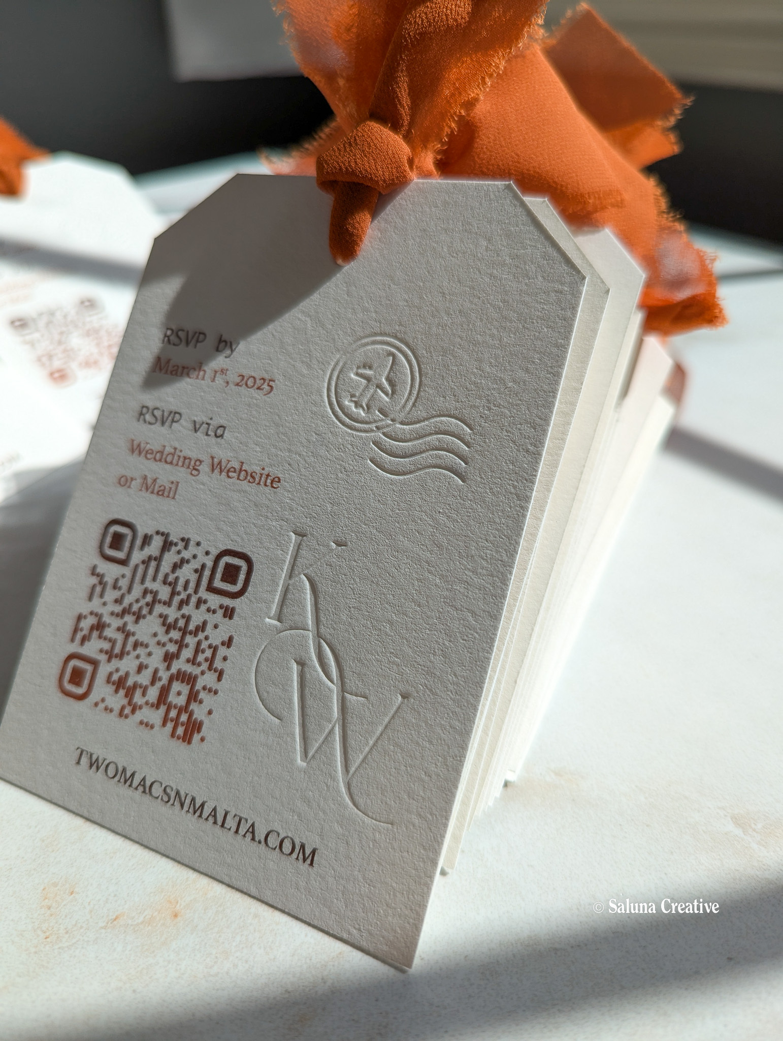 Blind letterpress invitation