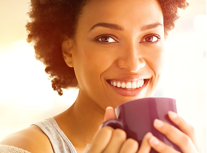 Woman drinking from a mug