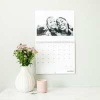 Personalize your custom wall calendar by marking important dates with images and text