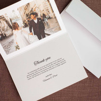 Express heartfelt gratitude with a wedding thank you folded card, elegantly designed to showcase your appreciation with personal photos and a handwritten touch inside
