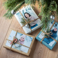 Add a personal touch to your gift wrapping with photo prints that double as meaningful tags or keepsake toppers