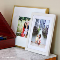 Put your happiest family moments on display in framed prints with a matte border like @ladanhayes on Instagram