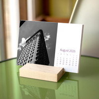 Elevate your workspace with a monochrome calendar that highlights your finest city shots in bold, gallery-style form