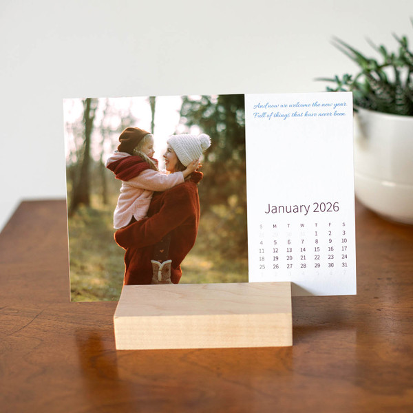 A thoughtful gift, this 12-card desk calendar brightens desks with memories all year long