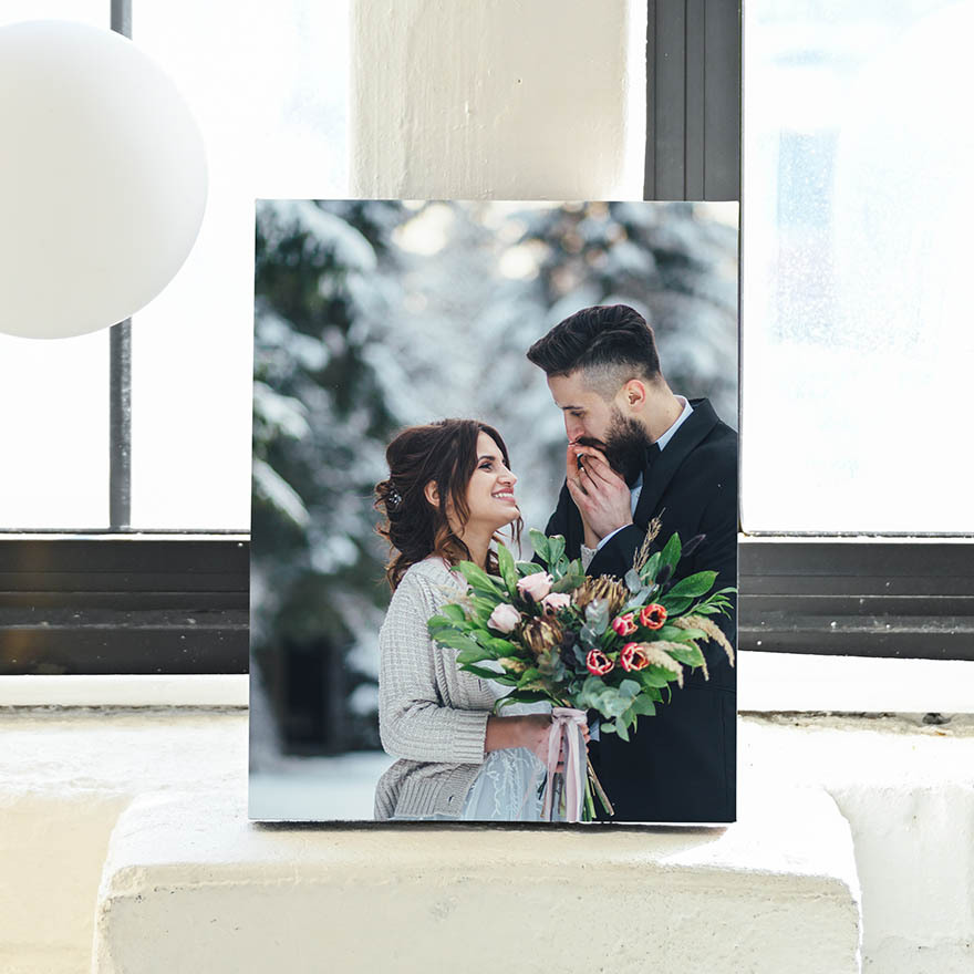 Celebrate your winter wedding in stunning detail with a custom canvas print that captures the elegance of the season