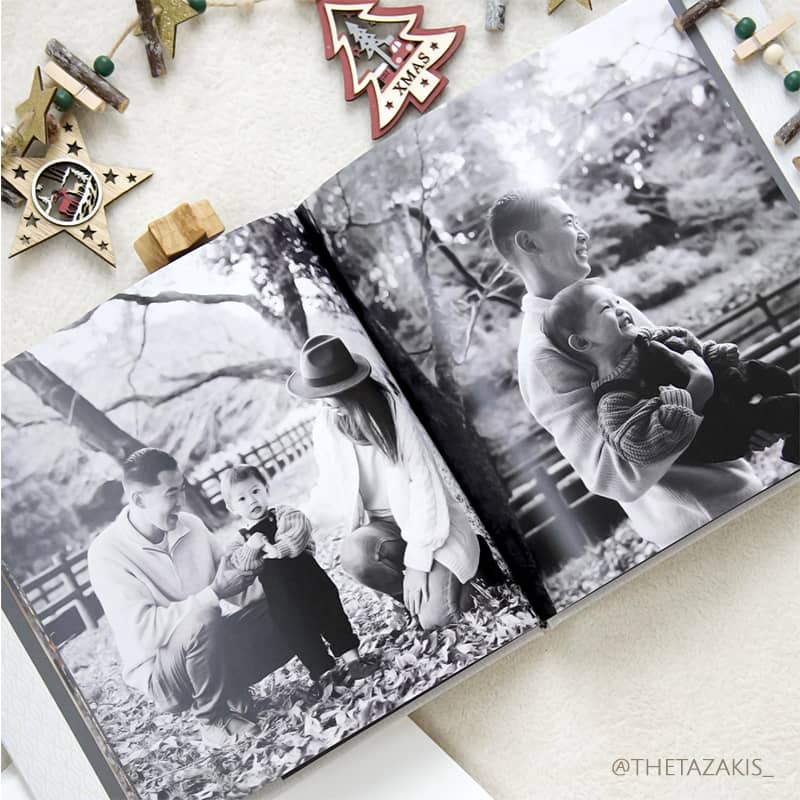 Fill an 8 x 8 inch hardcover photobook with your winter family portraits like @thetazakis_ on Instagram