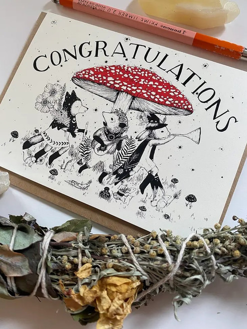 Congratulations!

Card is A6 4.5" x 6.25" and comes with an envelope and sleeved for protection.

Blank inside.

Professionally printed in the USA on heavy matte natural card stock.