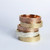10k and 14k gold 4mm sand bands in rose gold, yellow gold, and white gold. Printed with P.E.I. sand 10k and 14k gold 4mm sand bands in rose gold, yellow gold, and white gold. Printed with P.E.I. sand
