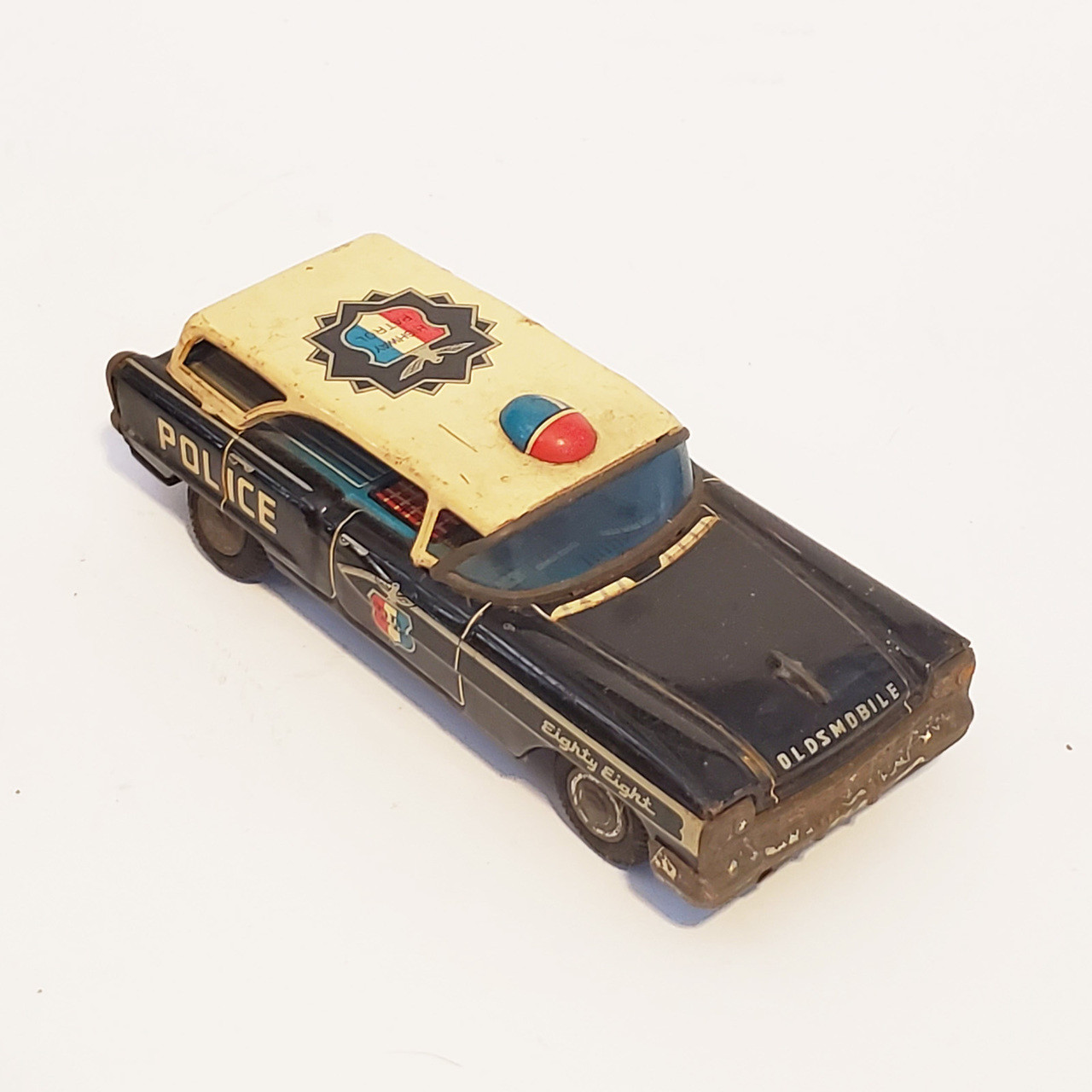 vintage police car toy