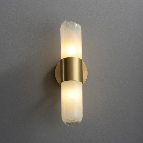 Front view of an illuminated Frosted Tube Wall Sconce wall light, showing the vertically placed frosted glass tubular shade and a central metal band.
