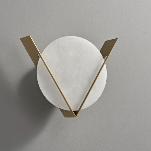 An unlit Disc Alabaster Wall Sconce wall light, showing the disc-shaped alabaster and the distinctive metal V-shaped frame support.