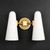 Front view of an unlit Bianco Double Sconce Brass wall light, emphasizing the shape and texture of the two milky white conical glass shades and the metal base and arms with a burnished brass finish.