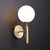 Saturn Wall Sconce Brass