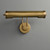 Front view of an unlit Chole Tube Picture Light, emphasizing the form of the gold metal tubular head and the structure of the adjustable arm.