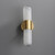 Front view of an unlit Frosted Tube Wall Sconce wall light, emphasizing the texture of the vertically placed frosted glass tubular shade and the central metal band.