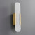 Side view of the unlit Faith Elongated Alabaster Sconce wall light, showing the elongated alabaster panel and the square brass backplate mounted to the wall.