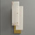 An Overlapping Alabaster Sconce wall light, showing the layered rectangular alabaster panels and the metal base when unlit.