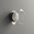An unlit Ava Layered Alabaster Glass Sconce mounted on a wall, viewed from the side showing the clear glass orb and the texture of the inner natural alabaster stone.