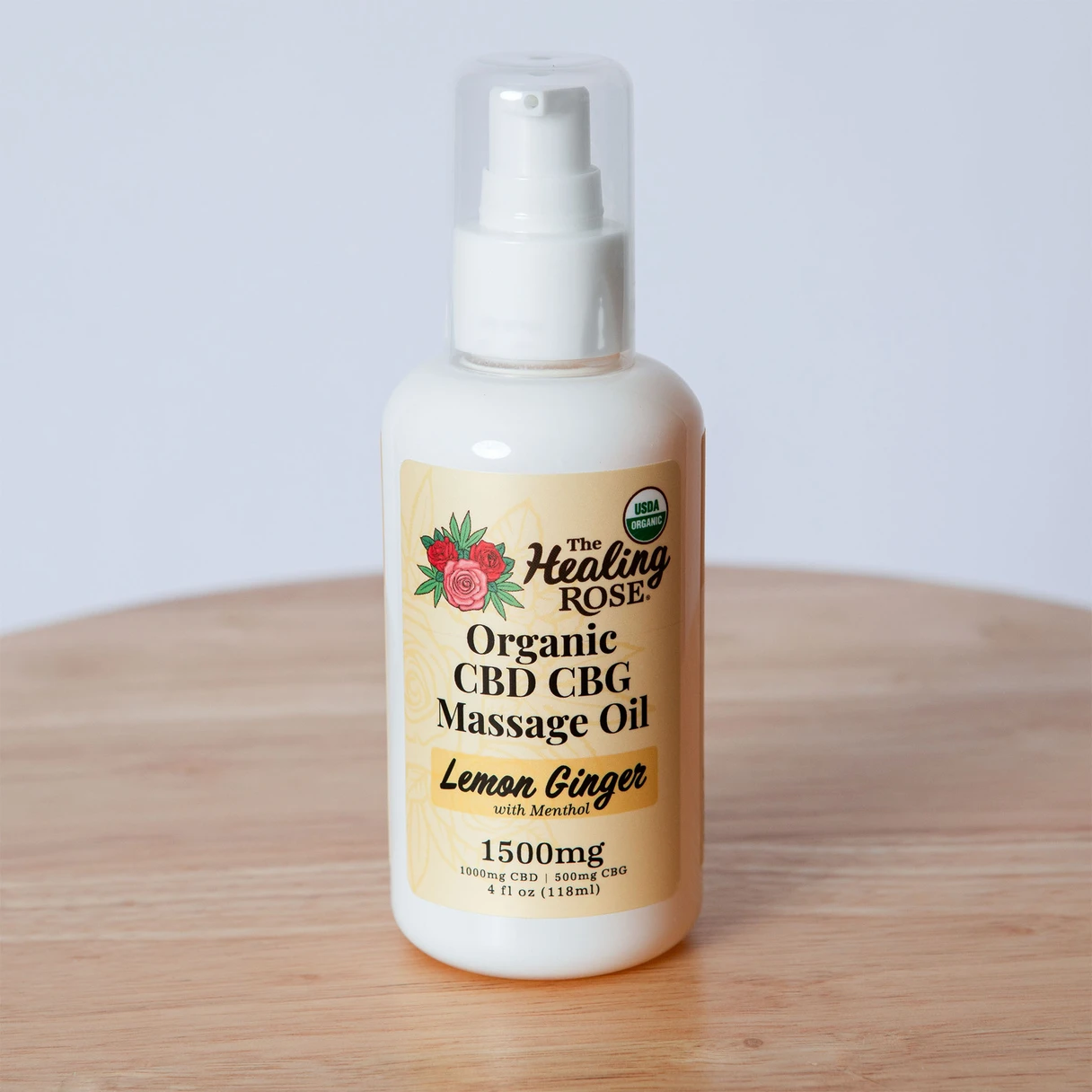 The Healing Rose Organic CBD CBG Massage Oil in Lemon Ginger with menthol, 1500mg, 4 fl oz pump bottle