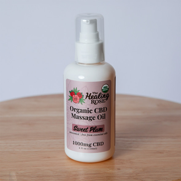 The Healing Rose Organic CBD Massage Oil in Sweet Plum, unscented and free from essential oils, 1000mg CBD, 4 fl oz pump bottle