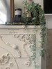 Dixie Belle Paint Dixie Dirt-4oz. 
Image shows corner of white dresser piece with Dixie Dirt on woodwork applique on drawers . Staged with two black books with a black candle on top of dresser with a plant pot with faux succulent plant hanging over everything above books.
