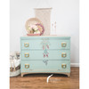 Belles and Whistles Boho Soul - Rub On Furniture Transfer, Best Transfers for Furniture.
This light blue dresser has Boho Soul transfers down the middle, front of the piece.  There are gold dresser pulls and is staged with round wicker baskets, candle holders, flowers and a macramé wall hanging.