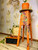 Belles and Whistles Fresh Picked Fifties -Rub On Furniture Transfer, Best Transfers for Furniture - plant stand chalk painted with the vine part of the Fresh Picked Fifties on it and a vintage album player next to it.