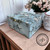 Blue chalk painted jewelry box with a gold knob. The Chinoiserie Transfer has been applied all over the box.