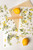 Three sheets of floral and lemon-themed transfer decals are arranged on a wooden board with two fresh lemons and a wooden stick labeled "Dixie Belle" on a white background.