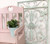 Dixie Belle Paint Soft Pink Chalk Mineral Paint is the perfect paint for any DIY project! A wooden chair with a heart of the top middle of the back and the chair is painted in soft pink chalk mineral paint with a distressed look on the edges.