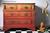 Dixie Belle Paint Terracotta Chalk Mineral Paint painted furniture piece, three drawers with an ombre effect.  Three bananas are floating to the right of the painted furniture piece
