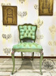 Dixie Belle Paint Holy Guacamole Chalk Mineral Paint is the perfect paint for any DIY project!
An antique chair with mint green cushion painted in Holy Guacamole Chalk Mineral Paint. Staged on distressed wood floors and two bronze wall decor hanging on the wall.