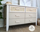 Dixie Belle Paint Burlap Chalk Mineral Paint is the perfect paint for any DIY project!
Dresser drawers painted in Burlap Chalk Mineral Paint with two cane drawers as the 2 top drawers. Staged on top of a brown woven rug.