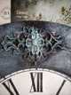 Dixie Belle Paint Patina Spray. Floral Décor on clock made to look rusty with Patina Spray and Paint.