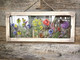 WoodUBend Floral Applique #1479 (Set of 5) is the perfect mouldable embellishment for any project!
A framed clear plastic with the Wildflowers & Butterflies - Transfer, on all 4 corner of the frame is the Floral Applique #1479 . Staged hanging on a rustic wood wall.