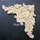 WoodUBend Corner Applique #1354.29 (Set of 2) is the perfect mouldable embellishment for any project!
This is a wood corner applique that can be secured to any piece of furniture.  This applique had a fan in the center and two flowers on either side of the fan.  It has a Victorian look with lots of "gingerbread" frills all over the corner applique.  This applique is resting on top of black leather.