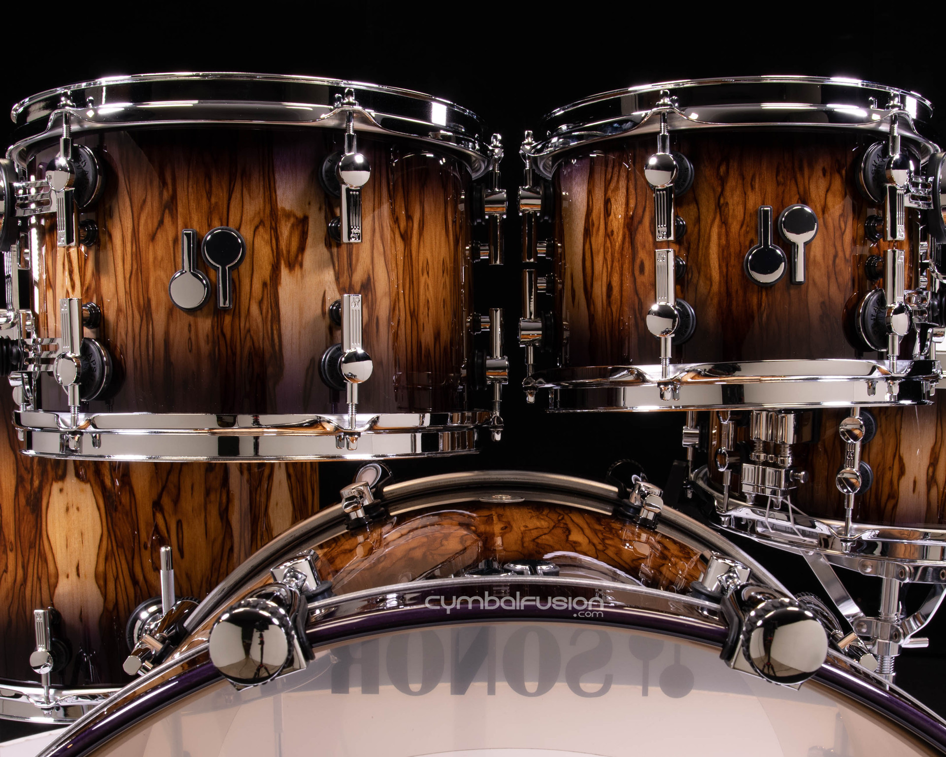 Sonor SQ2 6pc Violet Burst kits over African Marble - Maple Shells