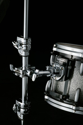 Image of Pearl universal clamp mounted on stand holding a tom