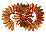 Warm beauty is on display in the CzechMates glass 16 x 5mm sunset maple two-hole dagger beads. These beads feature a dagger shape with two stringing holes at the top of the bead. They can dangle from designs or stand out in seed bead embroidery. The two stringing holes even allow you to add them to multi-strand looks. You will have even more design possibilities when you use these beads in your projects. They feature topaz orange color with a golden gleam. 