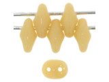 A buttery beige color decorates these Matubo SuperDuo beads. Create intricate jewelry designs with Czech glass seed beads! Featuring a unique shape and two stringing holes, these seed beads add a special touch of creativity to your designs. They have tapered edges and nest up nicely when strung, making them ideal for floral and woven designs. Add a special touch to your jewelry with Czech glass seed beads!  