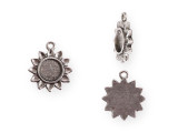 Floral style fills this itsy bezel sunflower pendant from Nunn Design. This pendant is shaped like a sunflower. The center of the flower is a round bezel with a flat bottom.  It would work well with resin or epoxy clay. There is a loop at the top of the pendant, so it is easy to add it to your designs. This pendant features an antique silver color. Bezel Dimensions: Inner Diameter 9.3mm, Depth 1mm